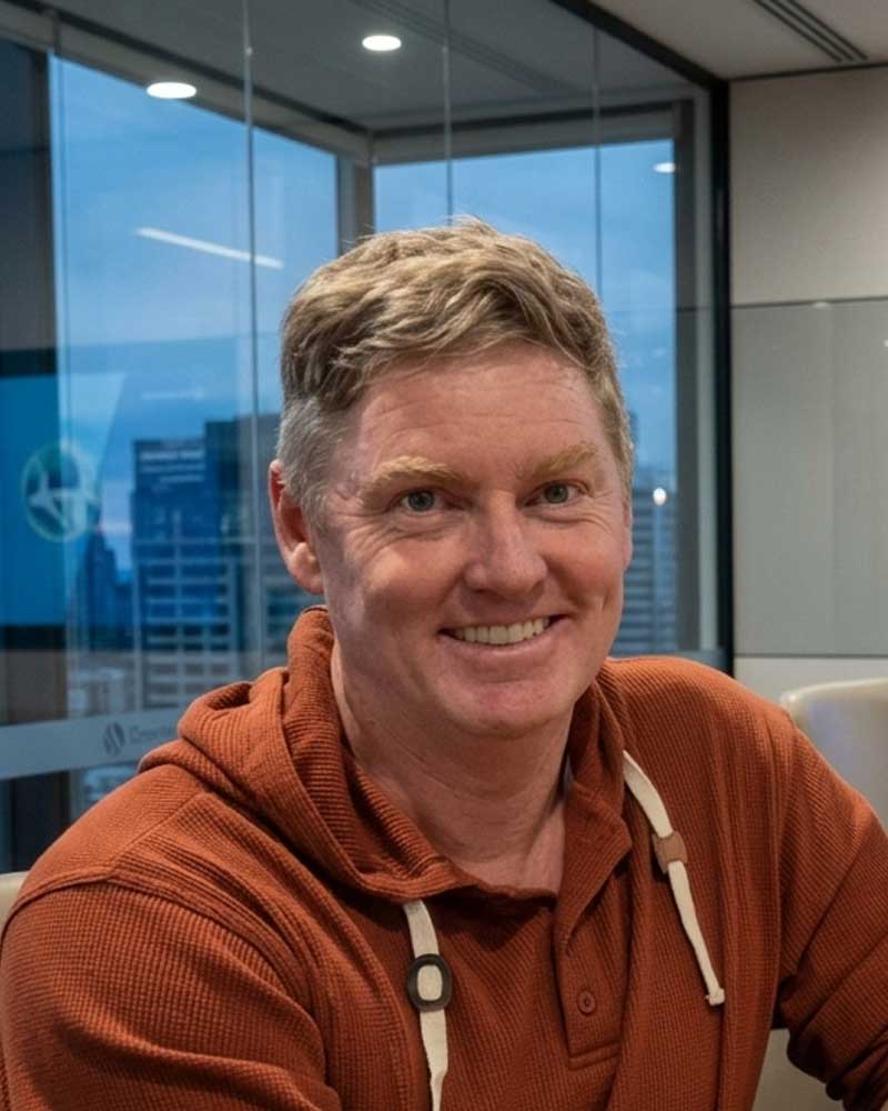 Portrait of Kris Barnes, Non-Executive Chairman